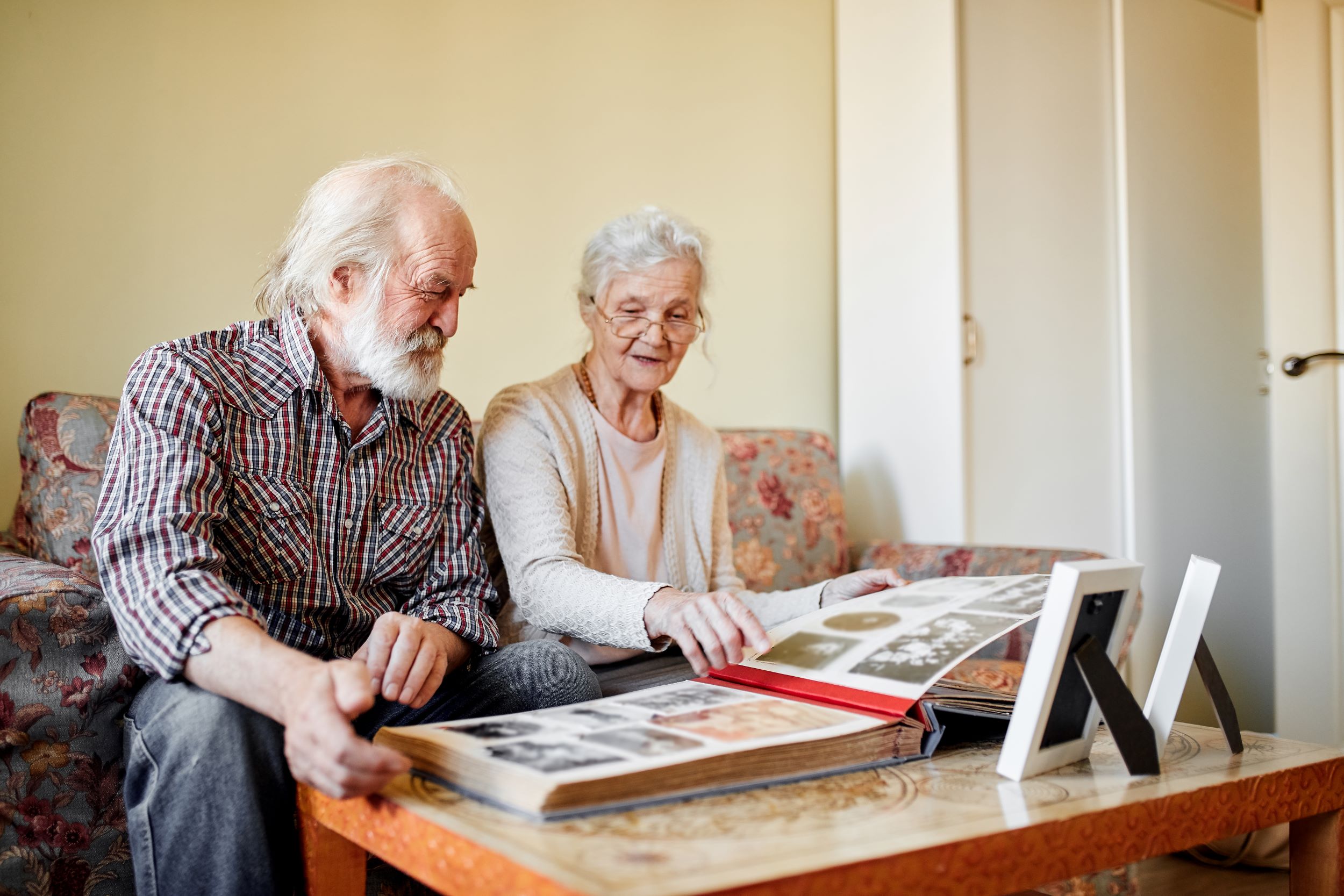 A couple looking through a photo album